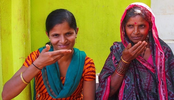 Mother and daughter using sign language