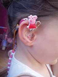 Hearing aid decorated with Peppa Pig