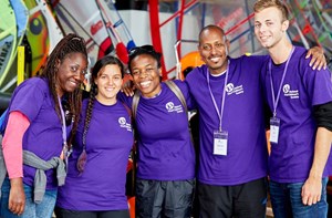 Group of people wearing purple National Deaf Children's Society T-shirts