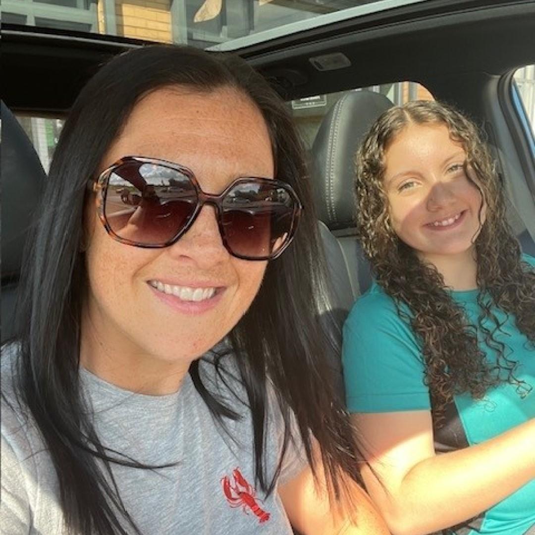 Mum and teenage daughter in a car