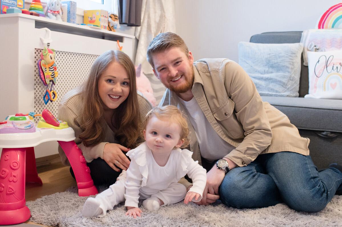 Mum and dad with baby daughter