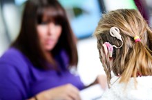 Young girl wearing a cochlear implant