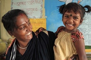 Bangladeshi woman and child smiling