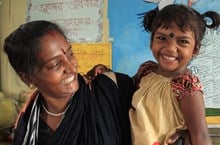 Bangladeshi woman and child smiling