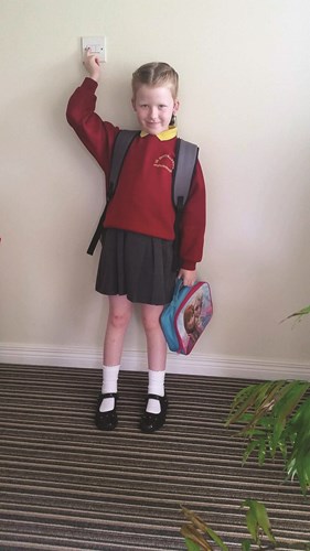 Deaf girl in school uniform