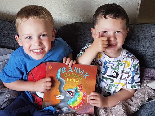 Deaf twins with Ranvir Cannot Hear book