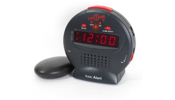 A round, black Sonic Alert Sonic Bomb Junior with red digital numbering.