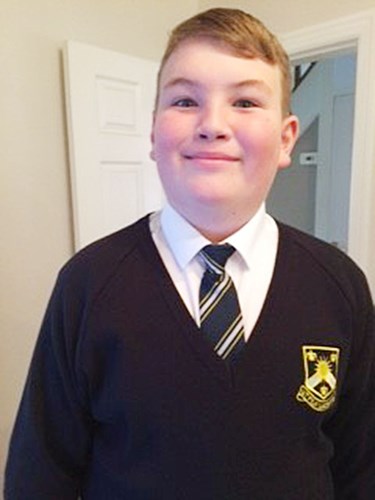 Deaf boy in school uniform