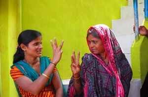 Two women using sign language
