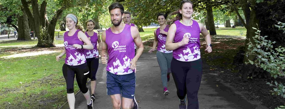 National Deaf Children's Society runners in a park 