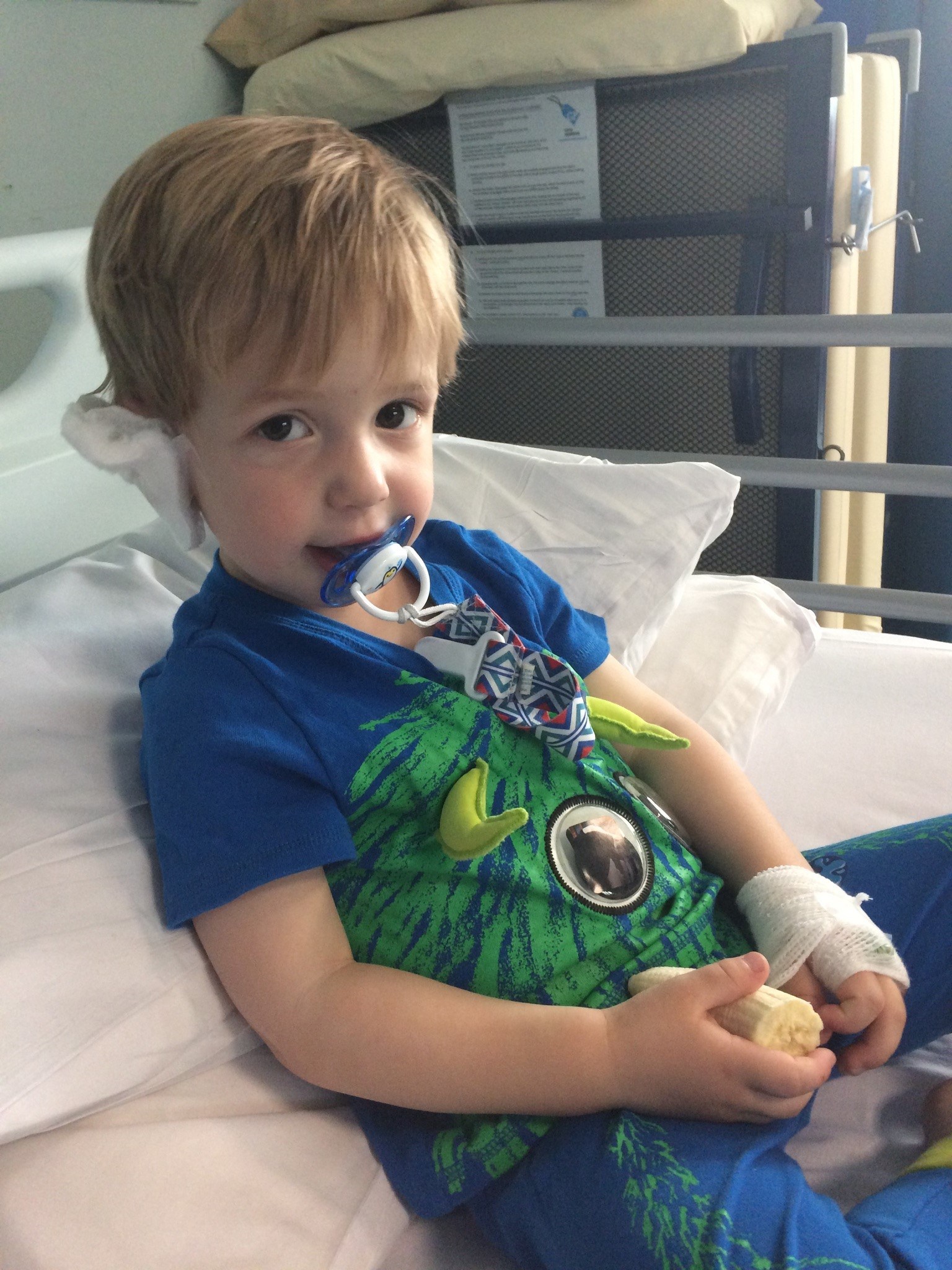 Boy in hospital bed