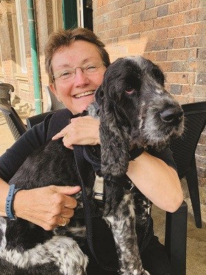 Angela with her dog Dasher.