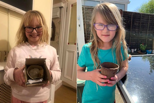 Children with empty plant pots