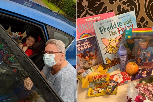 Parent and child in a car and a selection of books and treats for children