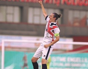 Claire Stancliffe cheering on the football pitch.