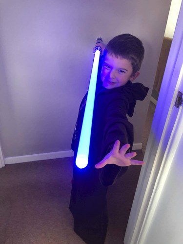 Boy with lightsaber