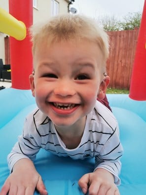 Boy on bouncy castle