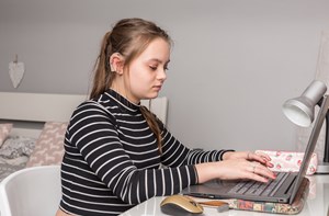 Deaf girl using a laptop