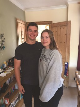 Boy and girl standing together