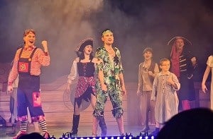 Charlie, 10, on stage for the Christmas pantomime, Peter Pan