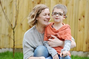 Woman and a young boy with Microtia and a BAHA