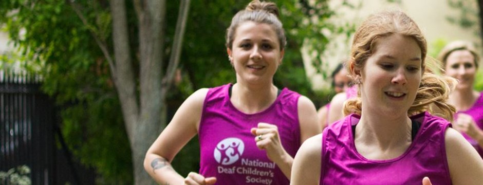 National Deaf Children's Society runners in purple vests