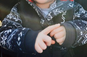 Baby hands making signs in British Sign Language