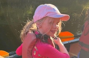 Sybil (6) on a canoe