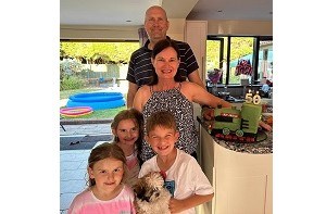 Grandparents Maria and Keith with their three grandchildren