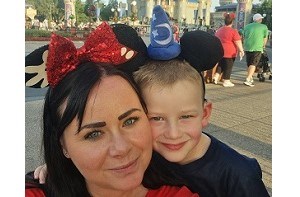 Kenzie (5) and mum Becky at Disney World wearing Mickey Mouse ears